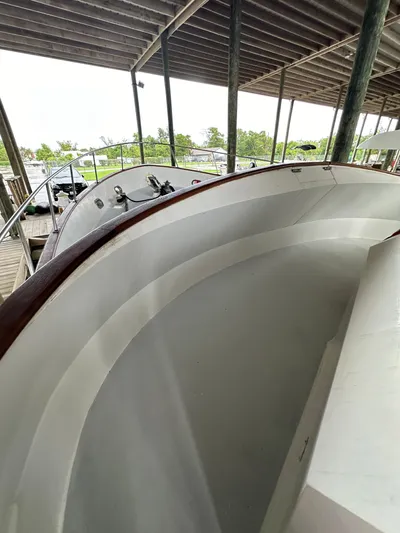 Ranger Yacht Photos Pics 1986 Cheoy Lee 66 Long Range Motor Yacht under covered dock.