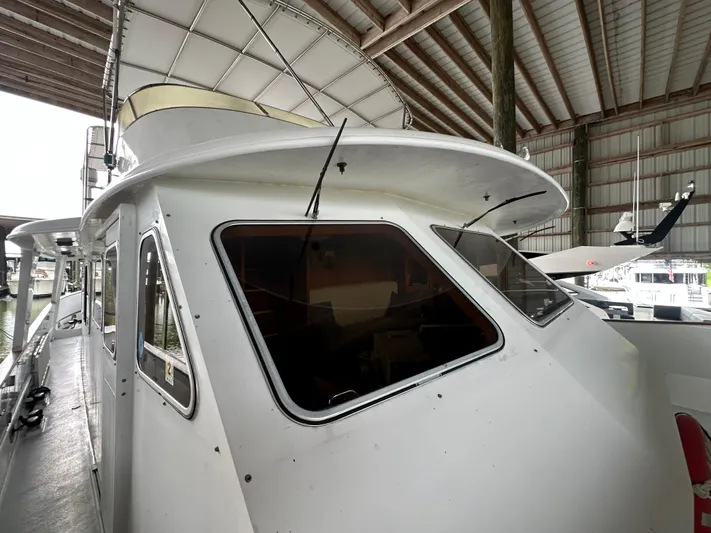 Ranger Yacht Photos Pics 1986 Cheoy Lee 66 Long Range Motor Yacht in covered dock.