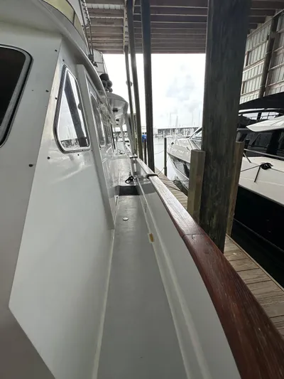 Ranger Yacht Photos Pics 1986 Cheoy Lee 66 Long Range Motor Yacht docked in marina.