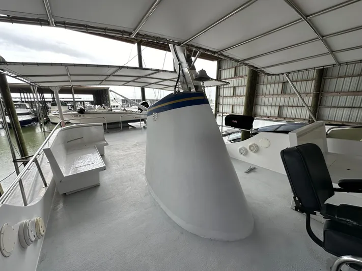 Ranger Yacht Photos Pics 1986 Cheoy Lee 66 Long Range Motor Yacht deck under covered marina.