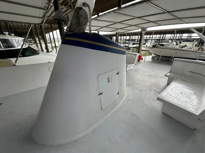 Ranger Yacht Photos Pics 1986 Cheoy Lee 66 Long Range Motor Yacht deck under covered marina.