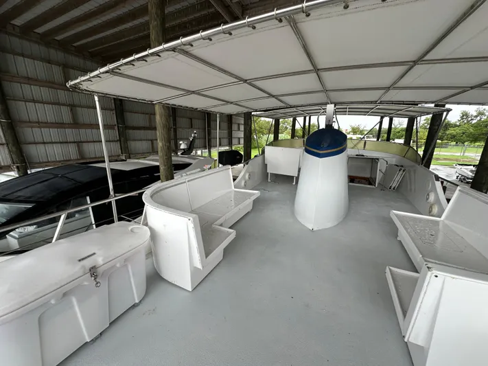 Ranger Yacht Photos Pics 1986 Cheoy Lee 66 Long Range Motor Yacht deck with seating under canopy.