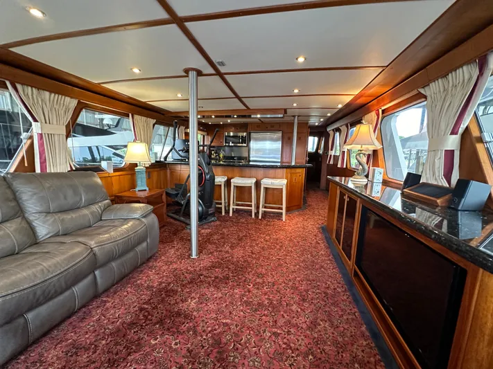 Ranger Yacht Photos Pics Luxurious interior of 1986 Cheoy Lee 66 Long Range Motor Yacht with elegant furnishings.