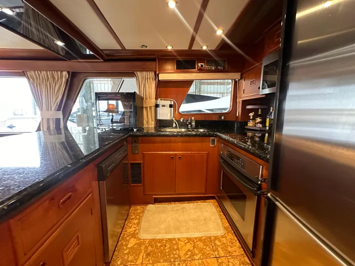 Ranger Yacht Photos Pics Luxurious kitchen interior of 1986 Cheoy Lee 66 Long Range Motor Yacht.
