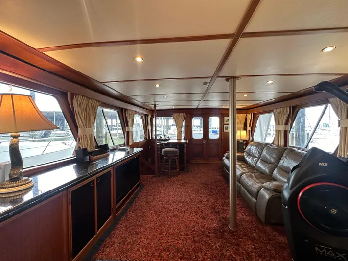 Ranger Yacht Photos Pics Luxurious interior of 1986 Cheoy Lee 66 Long Range Motor Yacht with elegant furnishings.