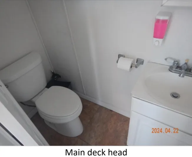  Yacht Photos Pics Main deck head with toilet and sink on 2010 Custom Semi Sub Power Catamaran.