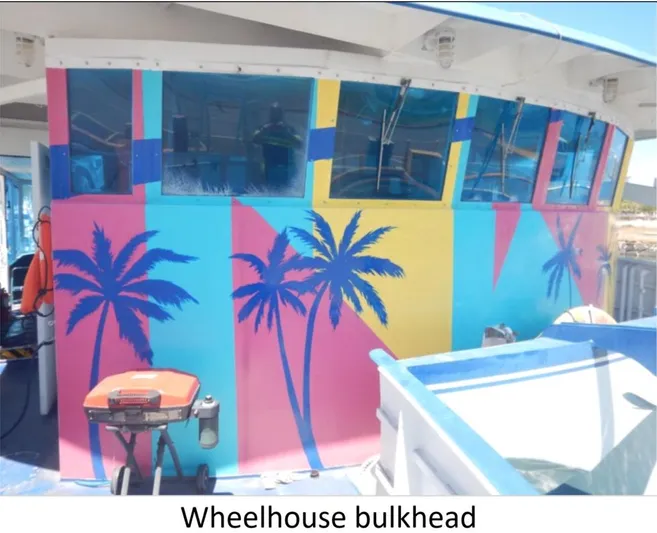  Yacht Photos Pics Colorful wheelhouse bulkhead with palm tree design on a 2010 Custom Semi Sub Power Catamaran.