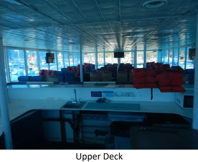  Yacht Photos Pics Upper deck of 2010 Custom Semi Sub Power Catamaran with seating and life jackets.