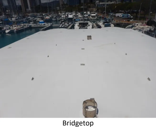  Yacht Photos Pics Bridgetop view of 2010 Custom Semi Sub Power Catamaran in marina setting.