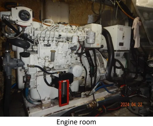  Yacht Photos Pics Engine room of 2010 Custom Semi Sub Power Catamaran with visible machinery and components.