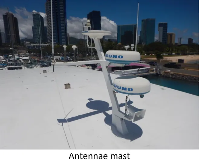  Yacht Photos Pics Antenna mast on 2010 Custom Semi Sub Power Catamaran with city skyline background.