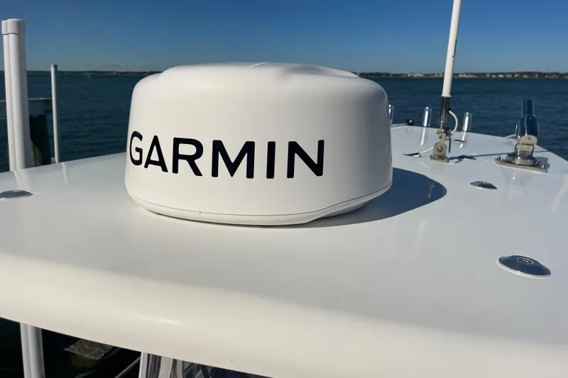  Yacht Photos Pics 2023 Pair Customs 24 Center Console DV with Garmin marine equipment on deck.