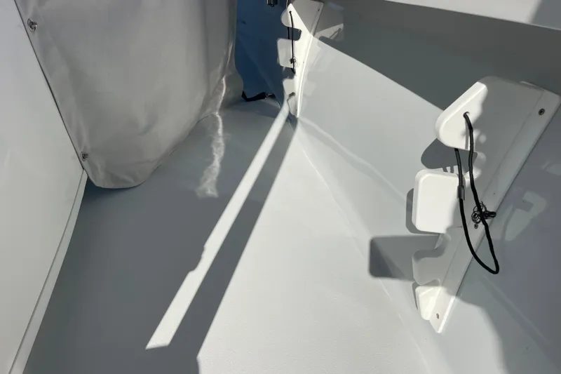  Yacht Photos Pics 2023 Pair Customs 24 Center Console DV interior detail with sunlight and shadows.