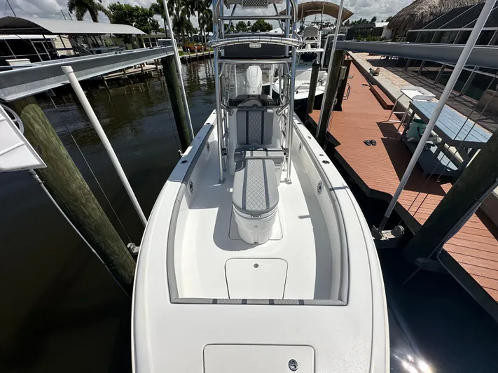  Yacht Photos Pics 2024 Lake & Bay 25 Open boat docked at marina, top view.