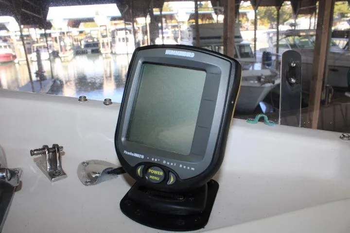 Carina Yacht Photos Pics Humminbird fish finder on 1990 Grand Banks 36 Europa boat, docked in marina.