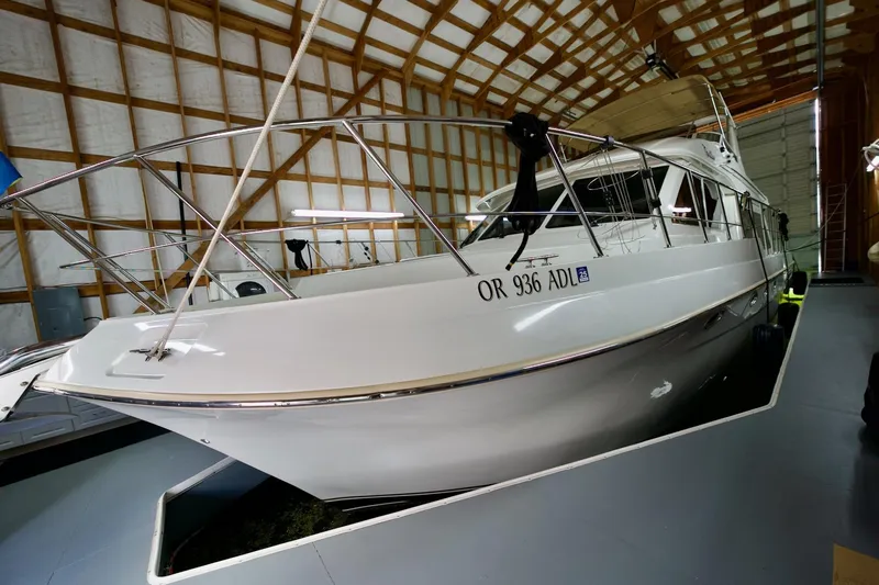 Nautilus Yacht Photos Pics 2008 Navigator 5100 yacht docked in a spacious indoor marina.