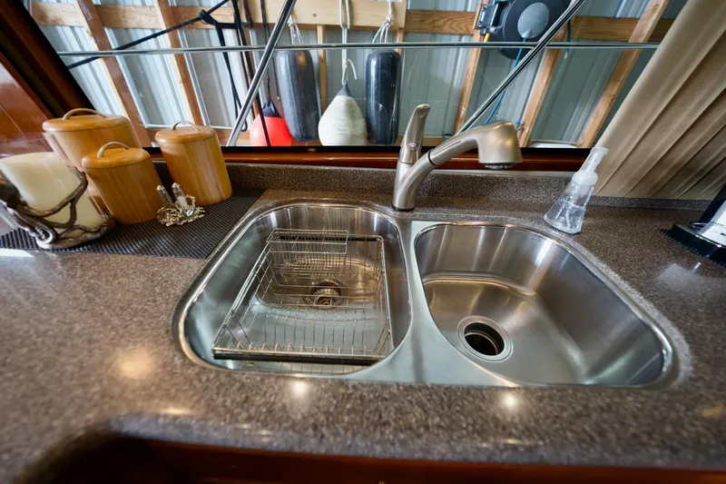 Nautilus Yacht Photos Pics Modern kitchen sink with dual basins in a 2008 Navigator 5100 yacht.