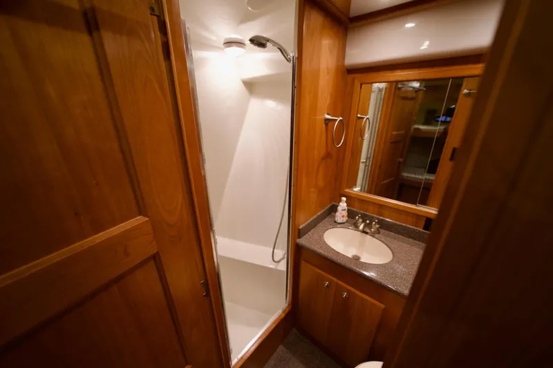 Nautilus Yacht Photos Pics Bathroom interior of 2008 Navigator 5100 yacht with shower and sink.
