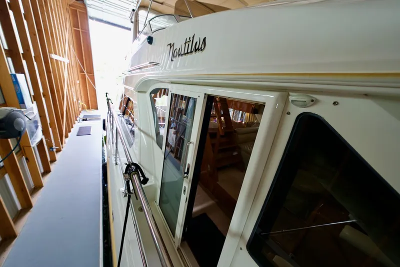 Nautilus Yacht Photos Pics 2008 Navigator 5100 yacht in storage, showcasing sleek design and luxurious interior.