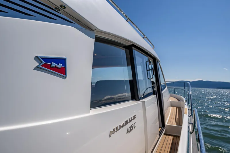  Yacht Photos Pics Nimbus 405 Coupé #88 yacht cruising on a sunny day, 2021 model.