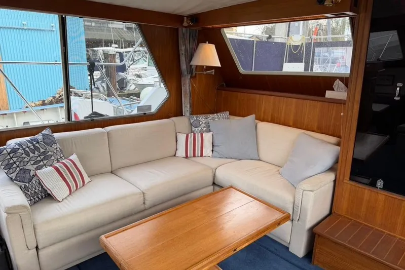 "sarona Ii" Yacht Photos Pics Interior of 1994 Tollycraft 45 Cockpit Motor Yacht with cozy seating and wooden accents.