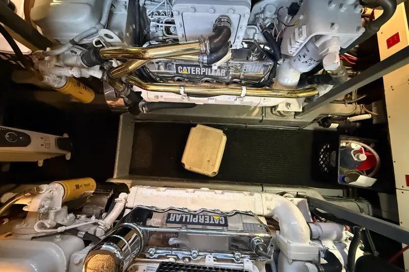 "sarona Ii" Yacht Photos Pics Engine room of 1994 Tollycraft 45 Cockpit Motor Yacht with Caterpillar engines.