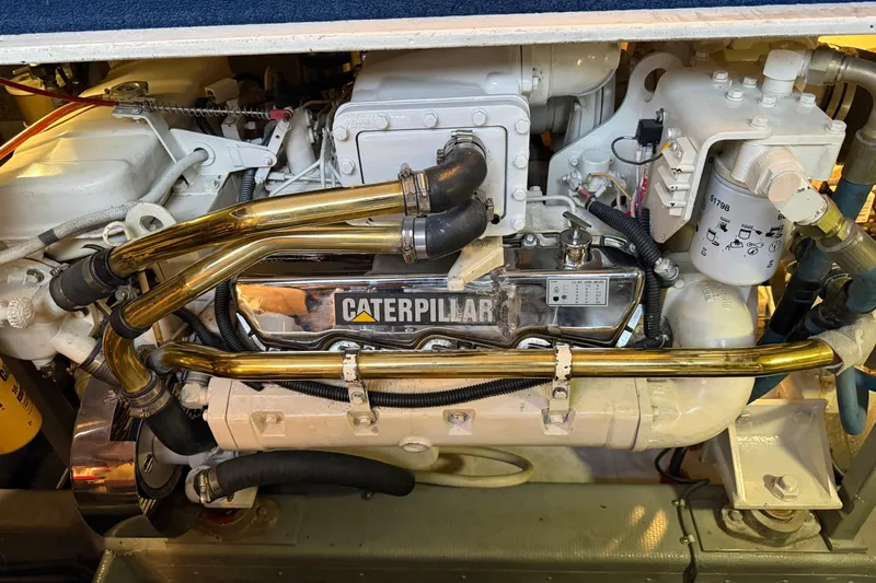 "sarona Ii" Yacht Photos Pics Engine compartment of a 1994 Tollycraft 45 Cockpit Motor Yacht with Caterpillar components.