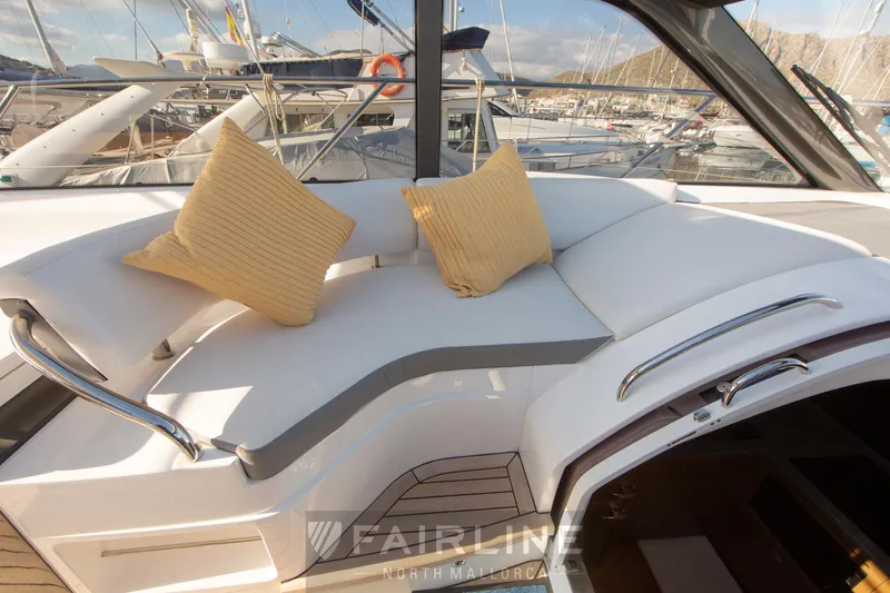  Yacht Photos Pics Luxurious 2017 Princess V48 Open yacht interior with plush seating and cushions.