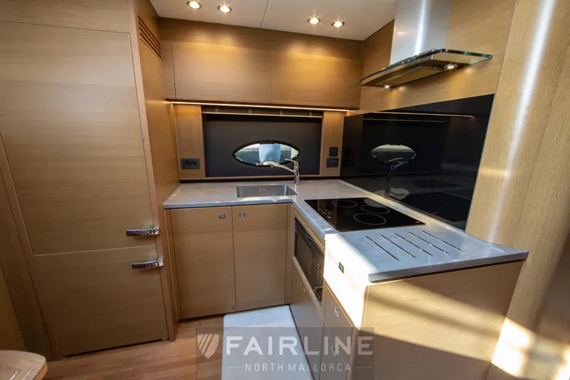  Yacht Photos Pics Modern kitchen interior of 2017 Princess V48 Open yacht.