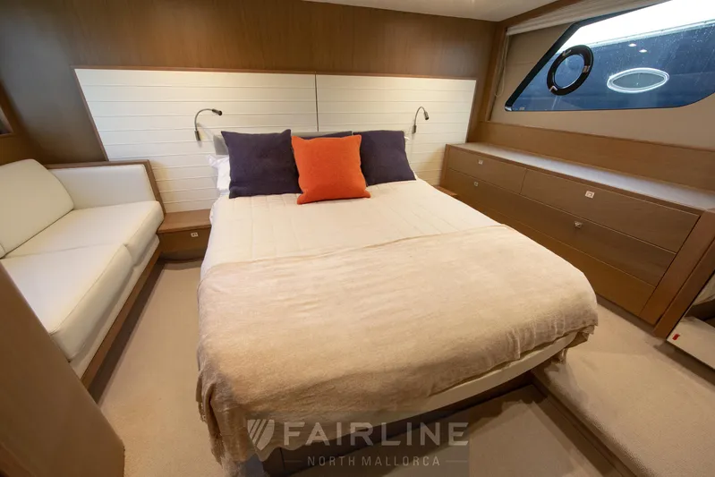  Yacht Photos Pics Luxurious bedroom interior of 2017 Princess V48 Open yacht with modern furnishings.