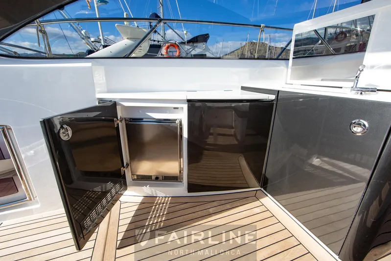  Yacht Photos Pics 2017 Princess V48 Open yacht deck with open storage compartments.