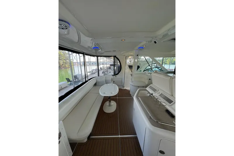 Yacht Photos Pics Luxurious interior of 2007 Sea Ray 40 Motor Yacht with elegant seating and modern amenities.