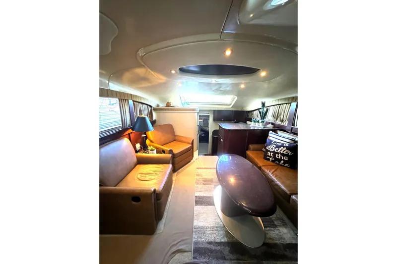  Yacht Photos Pics Luxurious interior of 2007 Sea Ray 40 Motor Yacht with elegant seating and modern decor.