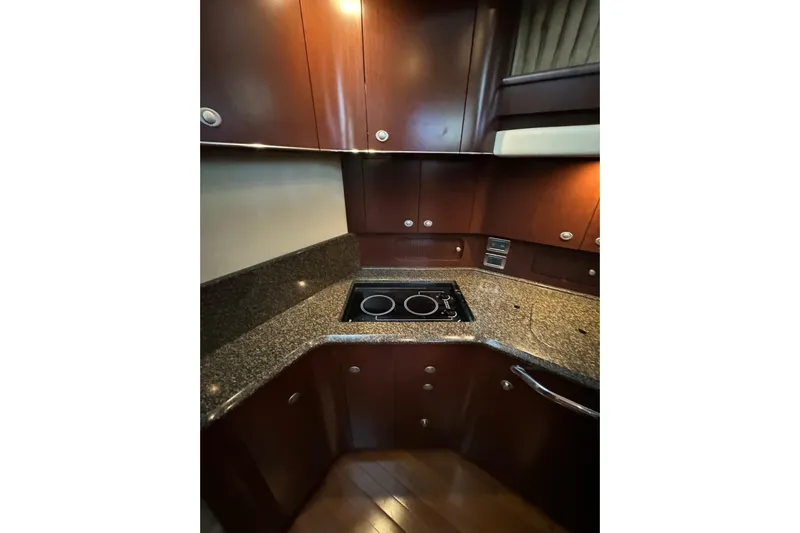  Yacht Photos Pics Luxurious 2007 Sea Ray 40 Motor Yacht kitchen with sleek countertops and modern appliances.