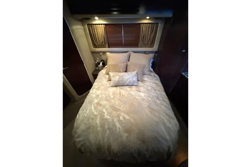  Yacht Photos Pics Luxurious bedroom interior of 2007 Sea Ray 40 Motor Yacht with elegant bedding.