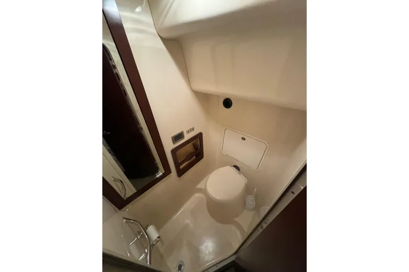  Yacht Photos Pics Bathroom interior of 2007 Sea Ray 40 Motor Yacht, featuring compact design and amenities.