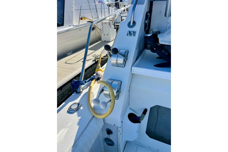 Live Wire Yacht Photos Pics 1982 Bertram 46 Convertible yacht helm with steering wheel and controls.