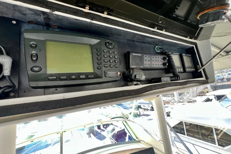 Live Wire Yacht Photos Pics Control panel of a 1982 Bertram 46 Convertible boat with navigation equipment.