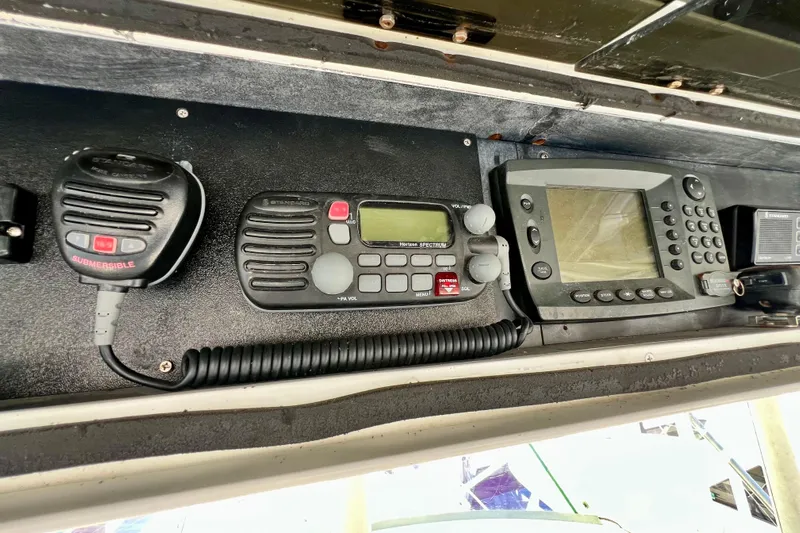 Live Wire Yacht Photos Pics Marine electronics on a 1982 Bertram 46 Convertible, featuring radio and navigation equipment.