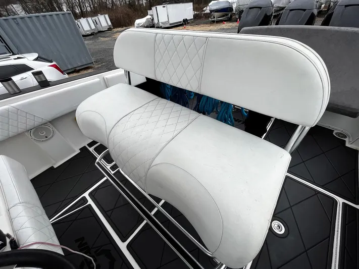 Steelin Time III Yacht Photos Pics 2011 Fountain 38 CC Tournament Edition boat with white cushioned seating.