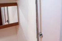 Shower area in 2017 Hanse 455 yacht, featuring modern fixtures and sleek design.