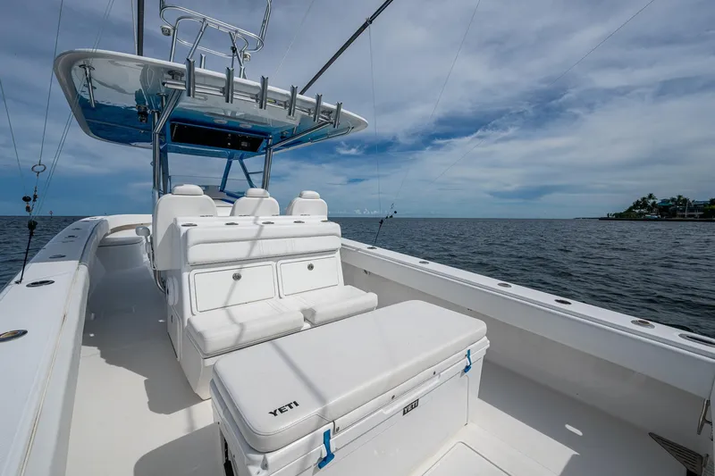  Yacht Photos Pics 2015 Bahama 41 boat interior with seating and ocean view under a cloudy sky.
