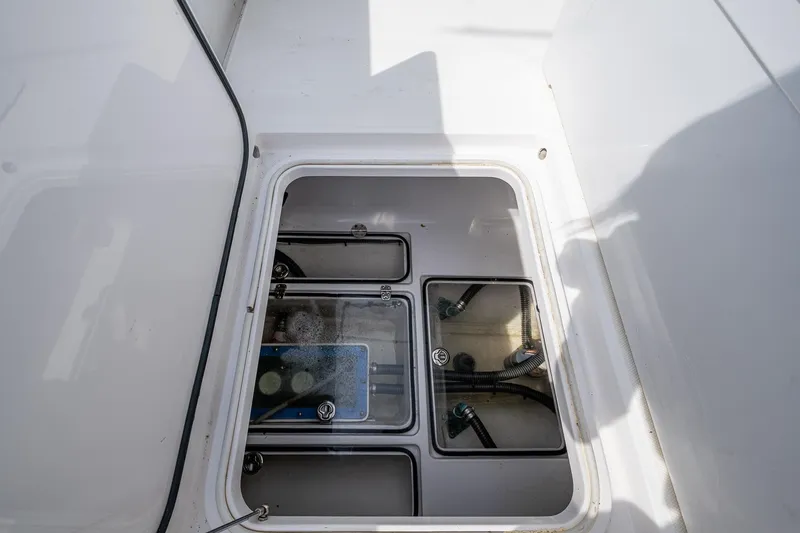  Yacht Photos Pics Open hatch of 2015 Bahama 41 boat showing internal compartments and wiring.