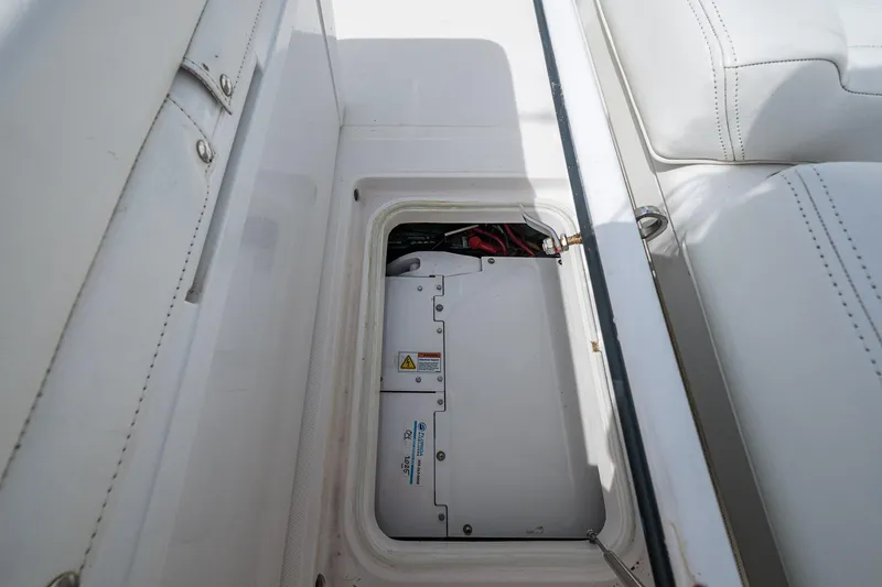  Yacht Photos Pics 2015 Bahama 41 boat storage compartment with electrical components visible.