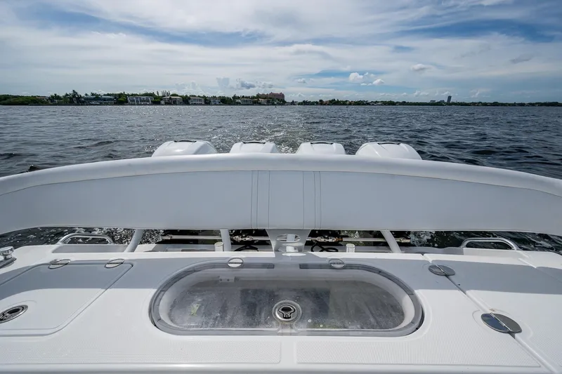  Yacht Photos Pics 2015 Bahama 41 boat on water, showcasing rear deck and engines.