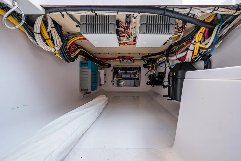  Yacht Photos Pics Interior view of a 2015 Bahama 41 boat's electrical wiring and equipment compartment.