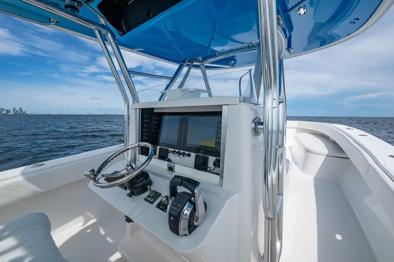  Yacht Photos Pics 2015 Bahama 41 boat helm with modern controls and ocean view.