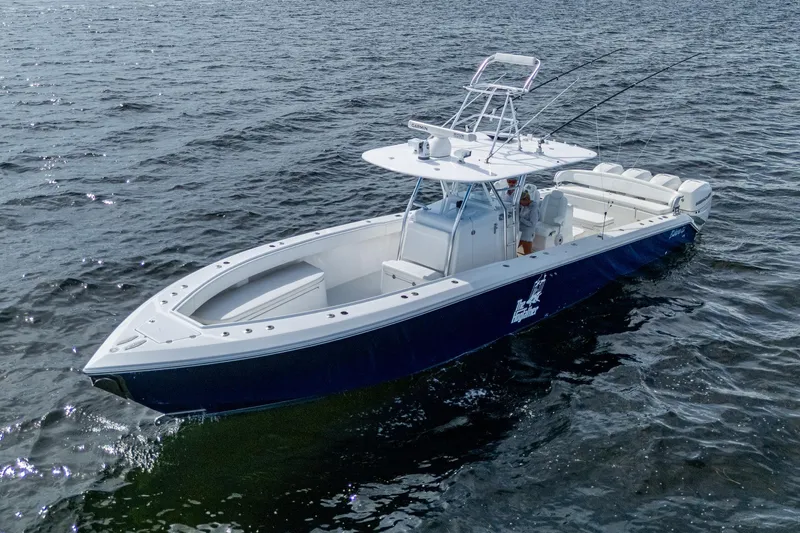  Yacht Photos Pics 2015 Bahama 41 boat on open water, featuring sleek design and spacious deck.