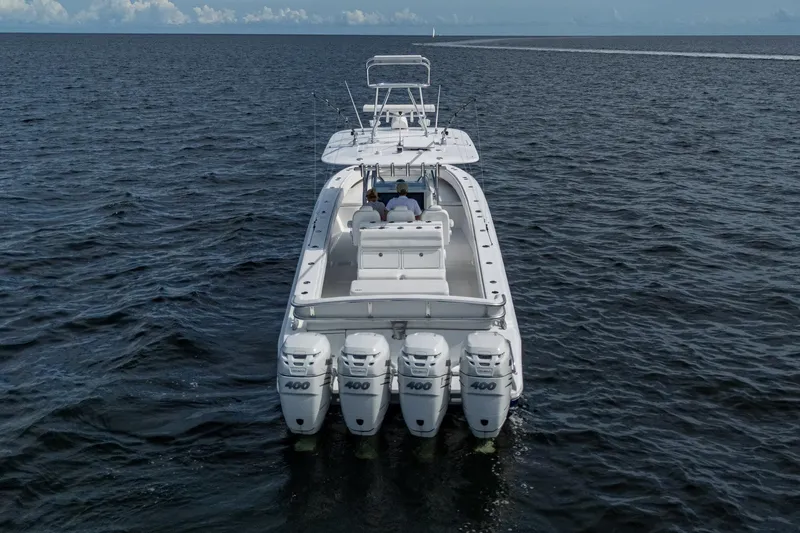  Yacht Photos Pics 2015 Bahama 41 boat with four 400 horsepower engines cruising on open water.
