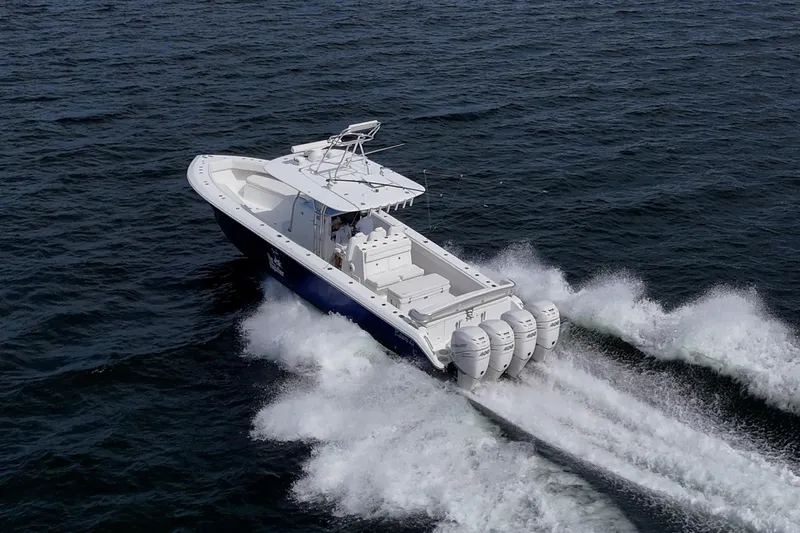  Yacht Photos Pics 2015 Bahama 41 boat with four engines cruising on open water.